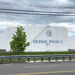 Holding tanks at Colonial Pipeline's Linden Junction Tank Farm in Woodbridge, New Jersey, U.S., May 10, 2021. REUTERS/Hussein Waaile  Holding tanks are pictured at Colonial Pipeline's Linden Junction Tank Farm in Woodbridge, NJ.