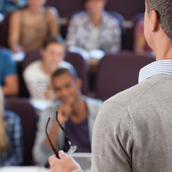 teacher addresses classroom