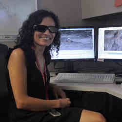 NASA engineer Vandi Verma wears special 3D glasses as she works as a driver of the Perseverance Mars rover.