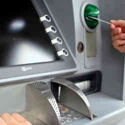 Using an ATM.