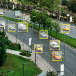 Artificial intelligence identifying, and watching, cars on the road. 