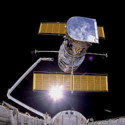 The Hubble Space Telescope, seen here during its initial deployment in 1990.