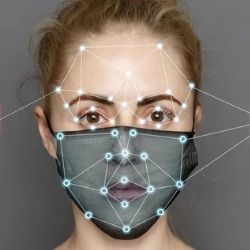 Woman in face mask shows various facial recognition points based on emotion