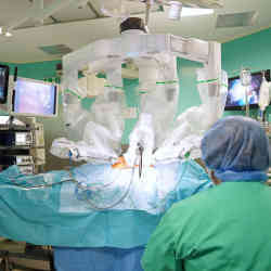 Surgeons using robotic tools during a surgical procedure. 