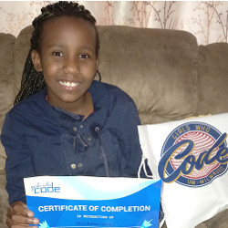 Elsie Maingi with Girls Who Code tote and certificate