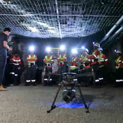 Mine workers are introduced to the drone. 