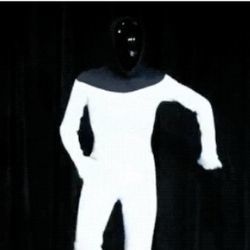 Human dressed in robot costume dancing