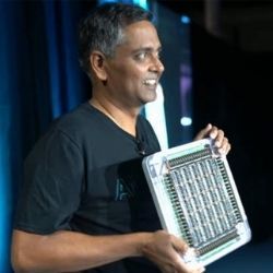 Tesla's Ganesh Venkataramanan holding a  9-petaflop training tile