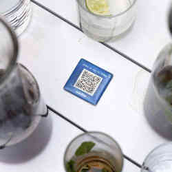 Drinks surround a barcode attached to a table at the Bartaco restaurant in Arlington, VA.