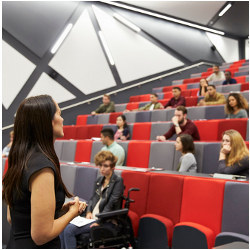 female lecturer in college classroom