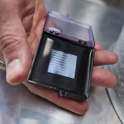 hand holding optical amplifier