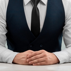 businessman wearing a vest and tie