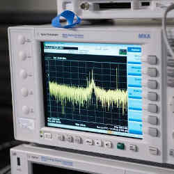 The researchers monitored radio waves emitted by the phones' processors with an oscilloscope.