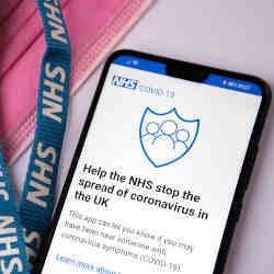 A smartphone containing the National Health Service App.