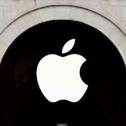 The Apple logo on the Apple store at The Marche Saint Germain in Paris, France.