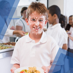 facial scan on student holding lunch tray