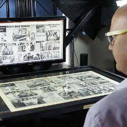 Digitizing a newspaper article.