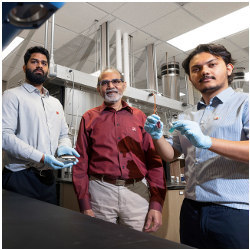 University of Nebraska-Lincoln's Abhijeet Prasad, Distinguished Professor Ravi Saraf, and Aashish Subedi in Saraf's lab