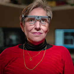 Berna Gmez of Elche, Spain, fully blind for more than 16 years, wears eyeglasses that give her limited sight.