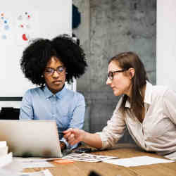 Women coding.