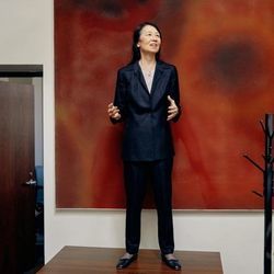 Data science expert Jeanette Wing standing on an office desk