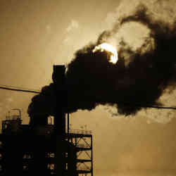 Carbon emissions from a manufacturing facility.