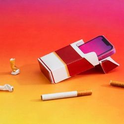 An illustration features a smartphone inside a cigarette carton as a comparison of the dangers of both.