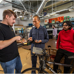 Northern Arizona University's Chun-Hsing Ho and students in Ho's lab with a bike