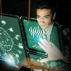 student gesturing towards a computer display