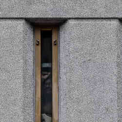 A prisoner looks out of his jail window in the federal detention center in Miami.