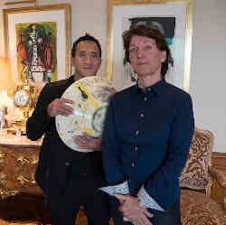 Marina Picasso, granddaughter of artist Pablo Picasso, with her son Florian Picasso and the ceramic artwork created by Pablo Picasso.