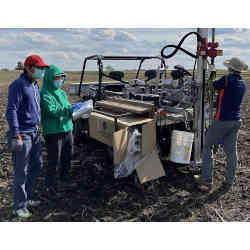 University of Illinois researchers collect soil samples. 