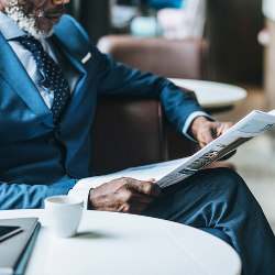 man reading a newspaper