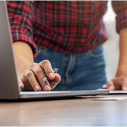 worker at laptop computer