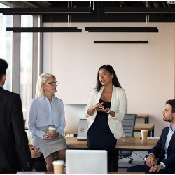 woman speaking at a business meeting