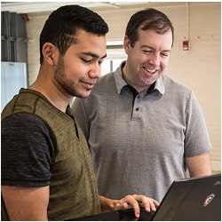 Clark University student Rafael Zuniga and Professor John Magee