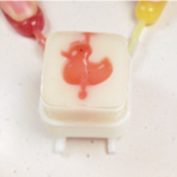 the 'duck' icon gate and flavorings in the Logic Bonbon system 