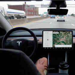 A Tesla Model Y driving on Autopilot.