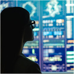 businesswoman looking at a display