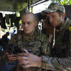 Ukrainian servicemen correcting artillery fire by drone at the front line near Kharkiv, Ukraine, on Saturday, July 2, 2022.