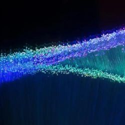 Fiber-optic cables illuminate.
