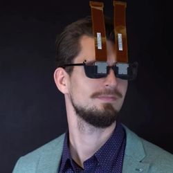 Person wearing virtual reality glasses.