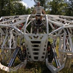 Canadian artist and engineer Jonathan Tippett sits inside Prosthesis, the mechanical robot suit he created