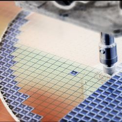 Silicon wafer in machine during semiconductor manufacturing.