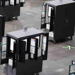 Voting machines open for maintenance. 