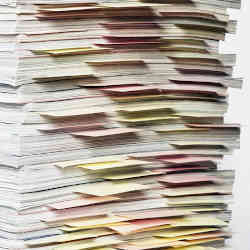 A stack of research papers.