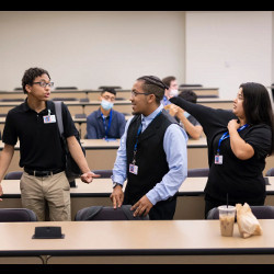 participants in the Year Up job-training program prepare for a class