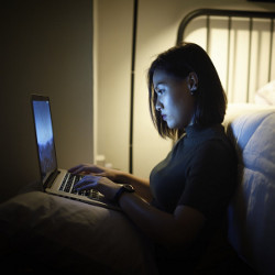 woman on laptop computer late at night