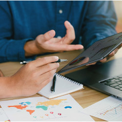 businessmen analyze data on tablet computer 