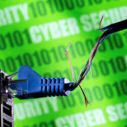 A broken Ethernet cable is seen in front of binary code and words "cyber security." 